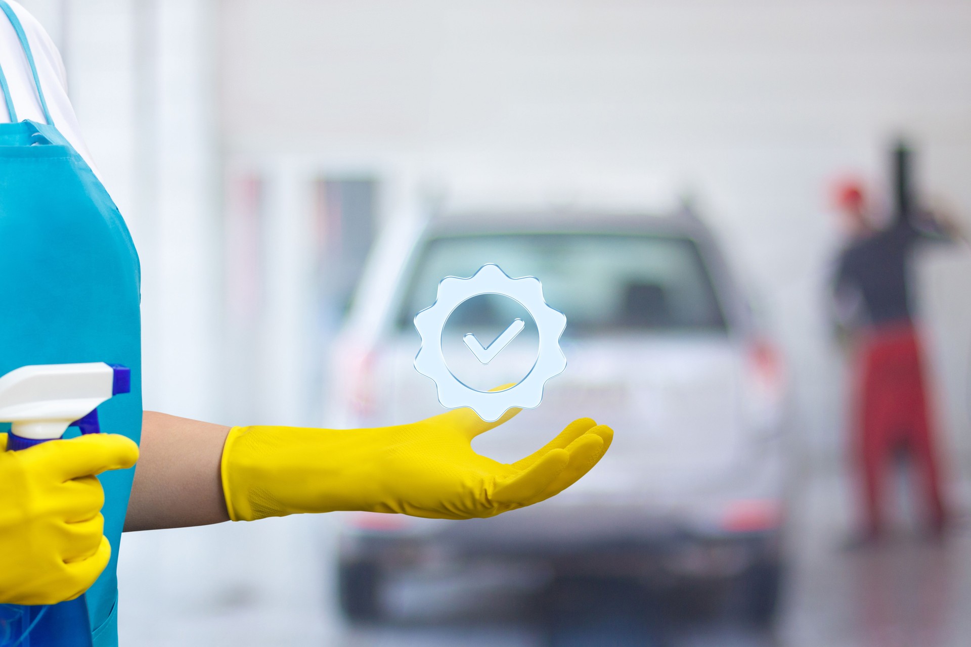 Cleaning service in action at a car wash facility